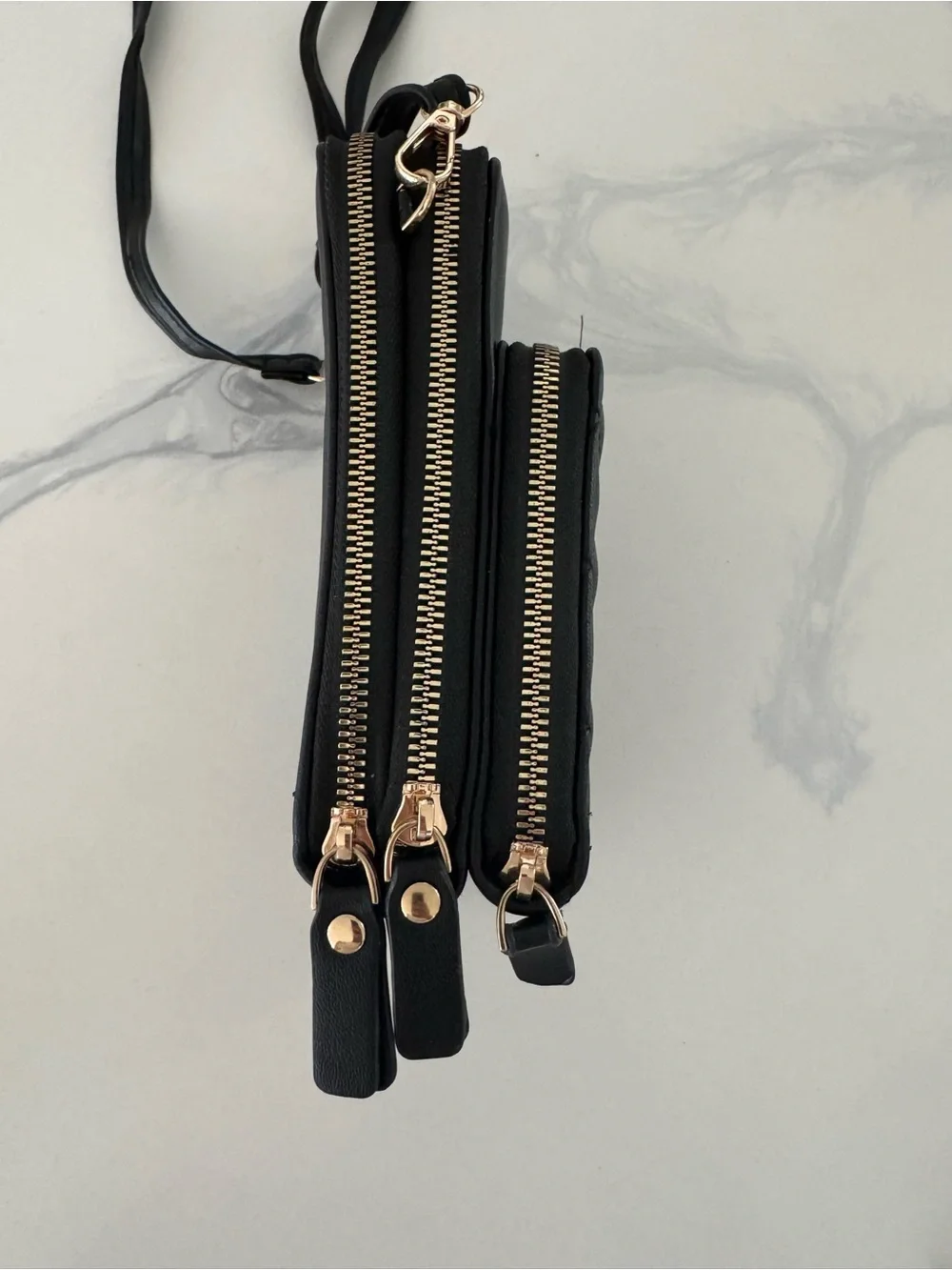 Elegant Black Crossbody Bag with Gold Accents - Minimalist Carry